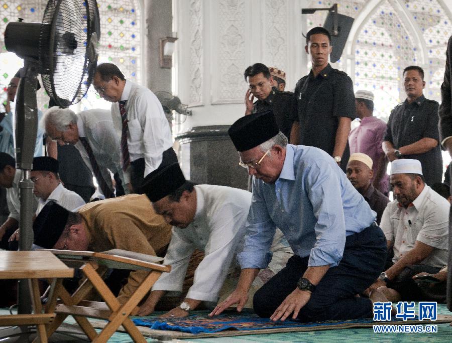 （马航客机失联·第7天）（3）马来西亚总理为失联航班上的人祈祷