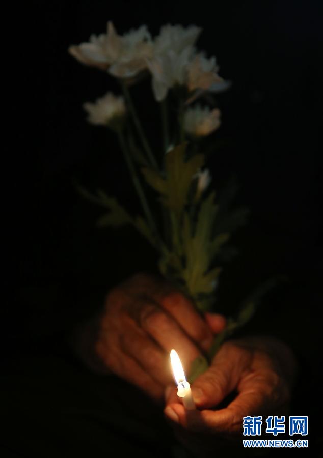 （xhdw）（2）马来西亚民众为马航失联客机祈福