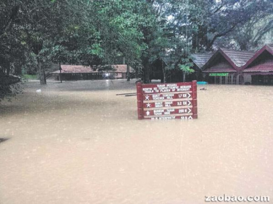 马来西亚水灾持续恶化近六万灾民被紧急疏散（图）
