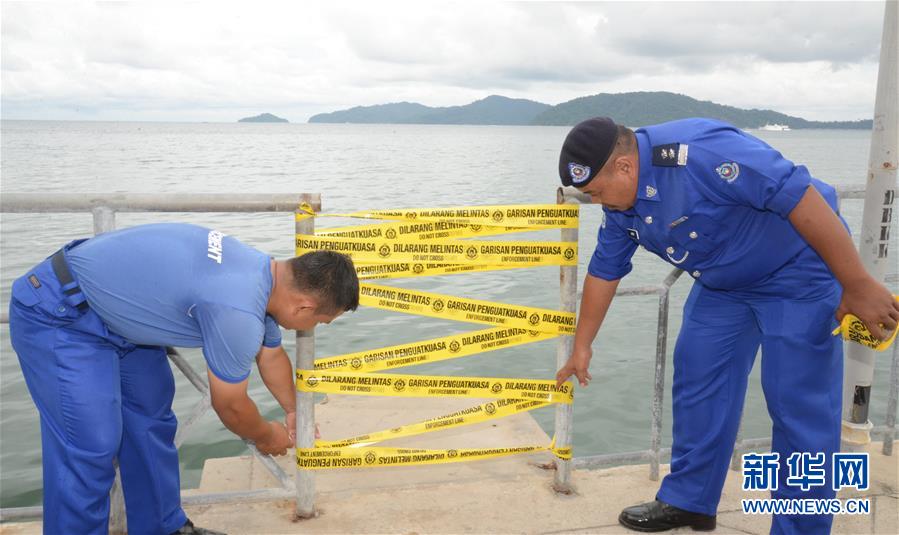 （国际）（1）马来西亚查封沉船事故中船只使用的非法出海码头