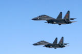 參加“航空飛鏢—2014”國際競賽的中國空軍分隊抵俄